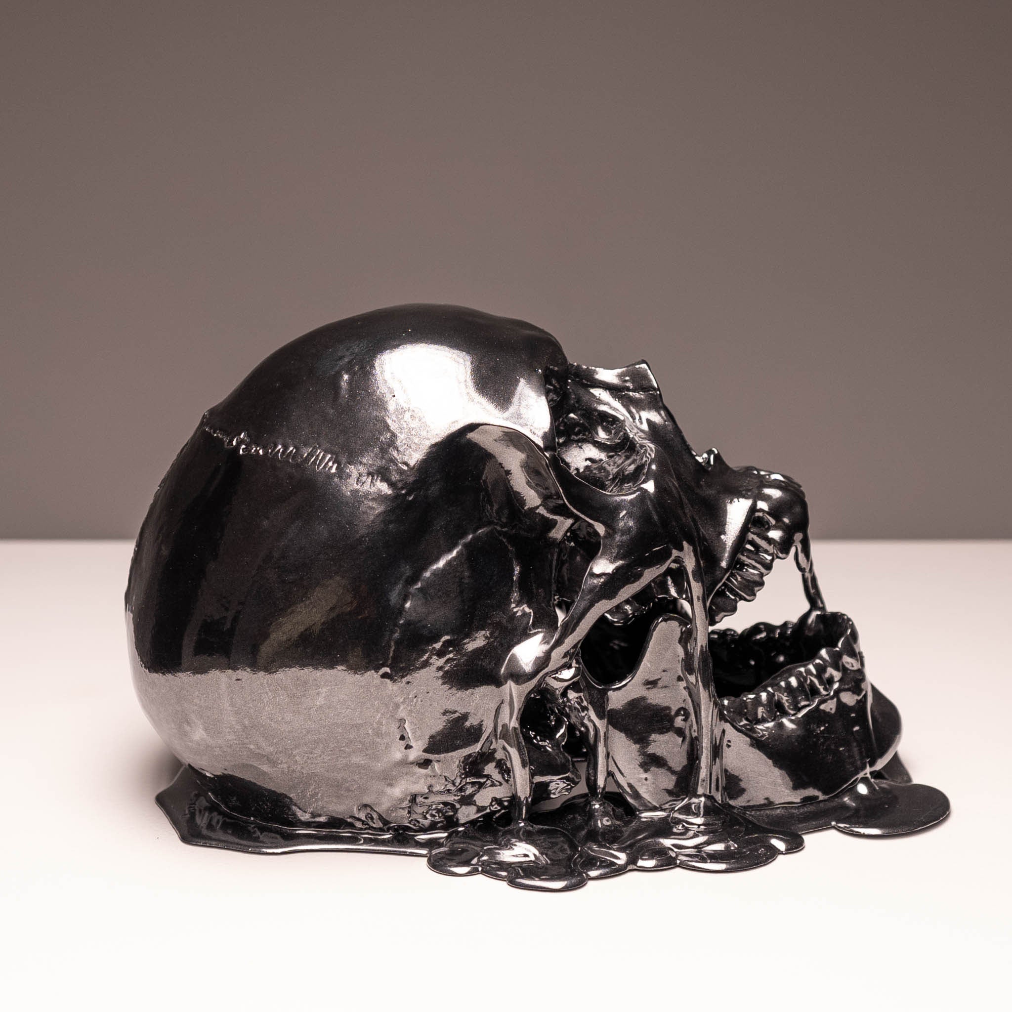 Melting Black Chrome Skull