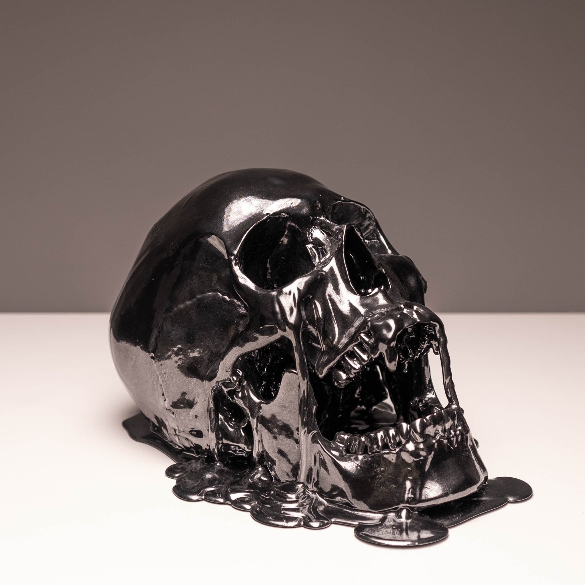 Melting Black Chrome Skull